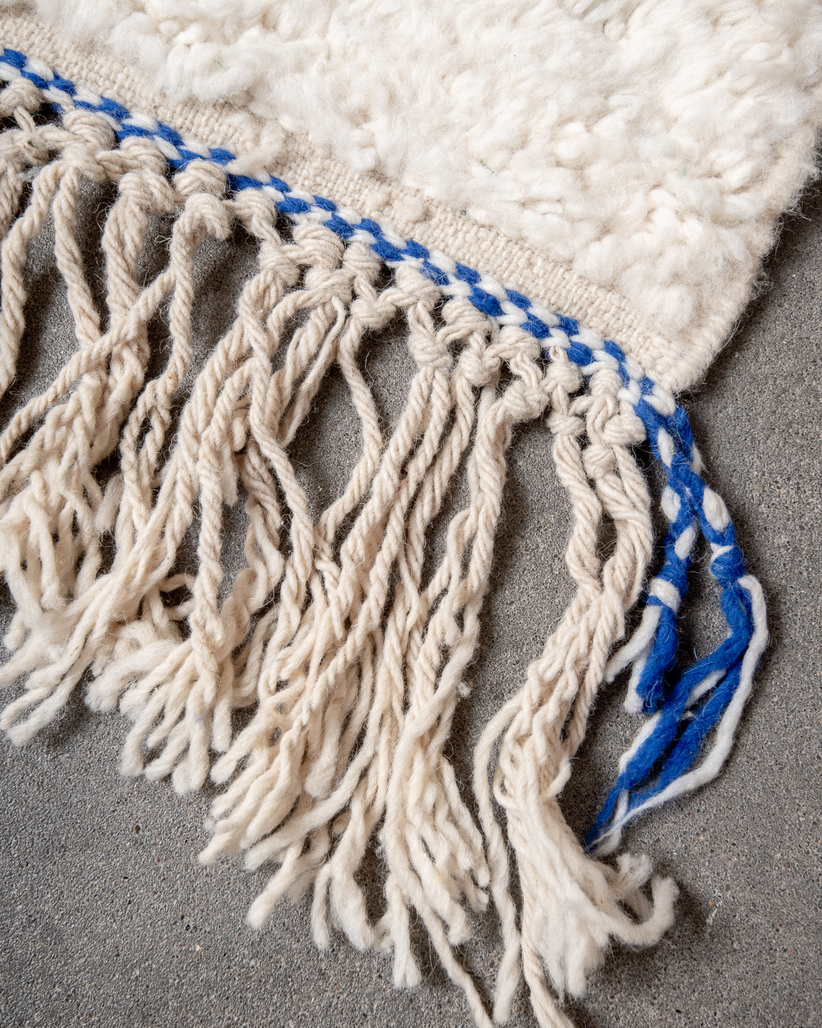 Modern, designer, handcrafted Berber rug from Morocco. Beniourain carpet with beautiful colours and patterns and fluffy wool texture.
